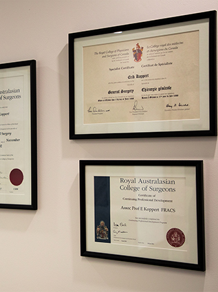 Mr. Erik Koppert's various degrees and fellowship certifications on display at his consulting rooms at Epworth Hawthorn.